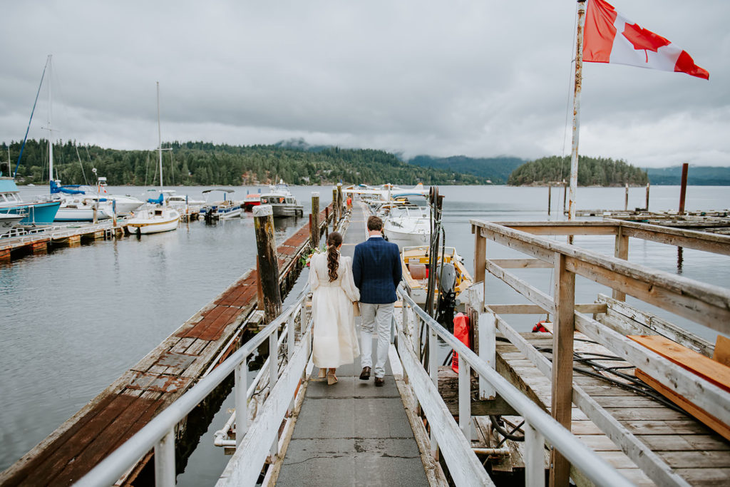 Couple headed down the Sunshine Coast air dock to board their seaplane for the British Columbia Adventure Elopement